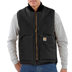 Men's, Water Repellent and Wind Resistant, 12 oz Firm Hand Duck. A great extra layer. Features12-ounce, heavyweight firm-hand, 100% ring-spun cotton duck. Water repellent and Wind resistant. Nylon lining quilted to arctic-weight 100% polyester insulationBrass center-front zipper with inside storm flapInside pocket with hook-and-loop closureTwo large lower-front pocketsDrop tailModel height: 6'; Chest size: 40"; Wearing size MModel No. OV0001-MCountry of Origin: Imported | Carhartt Men's Polyeste Carhartt Vest, Collar Vest, Duck Cloth, Carhartt Jacket, Warm Dresses, Mens Vests, Vests Mens, Carhartt Mens, Sherpa Lined