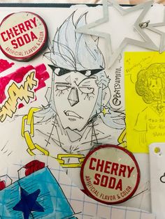 various stickers and magnets on top of a piece of paper that says cherry soda