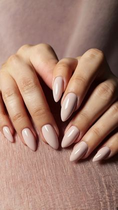 almond nails Sophisticated Almond Nails, Nude And Black Nails Almond, Light Tan Nails, Short Almond Nude Nails, Mauve Almond Nails, Nude Nails Almond Shape, Nails For Brown Skin Tone, Neutral Nails Almond, Milky Nude Nails