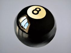 a pool ball with the number eight on it