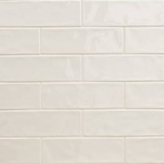 a white brick wall with no mortars on it