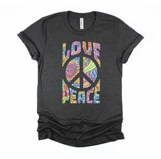 Unique colorful rainbow pastel art to promote peace, love, and happiness movement advocacy design to kindness, harmony, creativity and freedom. A 1960s and 1970s graphic art for pacifist, peace movement supporter, peace advocate, and peace activist. This t-shirt is everything you've dreamed of and more. It feels soft and lightweight, with the right amount of stretch. It's comfortable and flattering for all. * 100% combed and ring-spun cotton (Heather colors contain polyester) * Heather colors ar Peace Movement, Peace Sign Design, Peace Sign Shirt, Floral Peace Sign, 70s Retro Style, Peace Sign Shirts, Retro Fashion Outfits, Hippie Designs, Rainbow Pastel