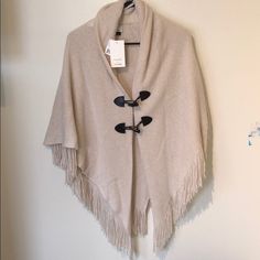 David & Young Poncho Chic Beige Poncho For Fall, Chic Beige Cape For Spring, Casual Cream Poncho For Fall, Cream Casual Poncho One Size, Cream Casual Poncho, One Size Fits All, Chic Beige Poncho For Spring, Casual Beige Spring Poncho, Cream Poncho One Size For Spring, Casual Beige Cape For Winter