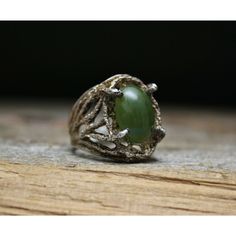 "A wonderful vintage Sterling Silver ring with green stone. The face of the ring measures approx. 3/4\" tall Size 6 Weight - 6 grams. Stamped Sterling. Great condition with vintage patina. Return We want you be happy with your purchase! Should that ever not be the case, we will gladly accept any return with a no questions asked policy. Return item in the condition they were received within 30 days for a full refund and initiate your return through the Etsy return center." Vintage Green Turquoise Ring, Hand Cast Vintage Rings For Anniversary, Vintage Hand Cast Rings For Anniversary, Vintage Hand-cast Rings For Anniversary, Vintage Jade Jewelry For Anniversary, Unique Green Emerald Anniversary Ring, Antique Green Emerald Ring Collectible, Antique Handmade Green Emerald Ring, Antique Green Emerald Collectible Ring