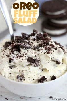 oreo fluff salad in a white bowl with chocolate chips