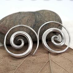 Handmade Sterling Silver Medium Size Simple Rustic Thick Spiral Tribal Earrings For Women Or Men Size: 7/8 Inches / 2.2cm - The Thinner Part Is Of The Spiral Is About 1mm (A Normal Earring's Hook) Metal Purity: 95-98% Silver. (Purer Than 925 Sterling Silver) Fake Gauge Earrings, Red Earrings Stud, Handmade Silver Jewellery, Indie Jewelry, Silver Statement Earrings, Spiral Earrings, Men Earrings, Simple Earrings, Ethnic Jewelry