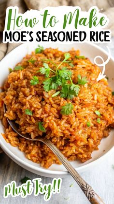 a white bowl filled with rice and garnished with cilantro on top