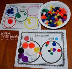 two paper plates with different colored pom poms on them