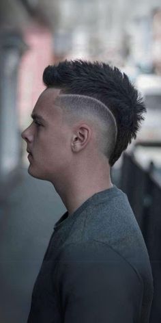 27 Ideas Stylish Faux Hawk Haircuts for Men - Discover Your Edge Mohawk Fade With Design, Mens Burst Fade Mohawk, Mens Hairstyles Faux Hawk Fade, Skin Fade Mohawk Shaved Sides, Thick Mohawk Men, European Mohawk Haircut, Men With Mohawks, Kids Mowhawk Hairstyles, Hawkeye Mohawk Haircut