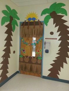 an open door with palm trees painted on it