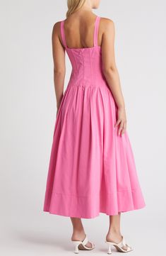 A boned corset gives way to a full skirt in a bubblegum-pink dress that's sure to turn heads. 50" length (size Medium) Back zip closure Sweetheart neck Sleeveless Cotton lining 85% cotton, 15% linen Hand wash, dry flat Imported Pink Fitted Midi Dress With Ruched Bodice, Pink Midi-length Corset Dress, Spring Pink Corset Dress With Lined Bodice, Fitted Square Neck Dress With Gathered Skirt, Pink Square Neck Corset Dress For Summer, Pink Fitted Bodice Corset Dress For Summer, Pink A-line Dress With Ruched Bodice, Fitted Pink Square Neck Corset Dress, Pink Midi Dress With Square Neck And Ruched Bodice