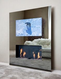 a large mirror reflecting a fireplace in the middle of a room with a television on it