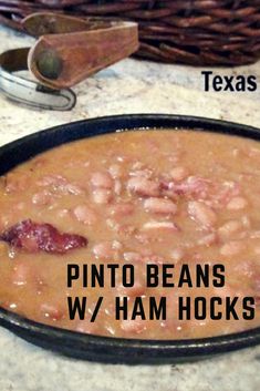 there is a bowl of beans and ham hocks