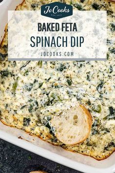 baked feta spinach dip in a casserole dish with bread on the side