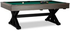 a pool table with two cues and balls on the top, in front of a white background