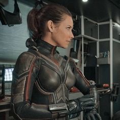 a woman in a futuristic suit with text that reads wasp evangeline lily as hope pym