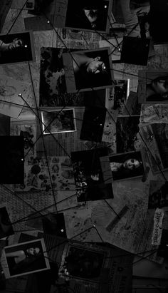 black and white photo collage with many pictures on the wall, including two men's faces