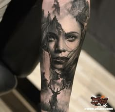 a woman's face with trees and mountains on her arm, done by tattooist