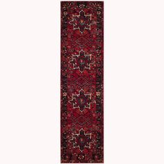 a long red rug with an intricate design