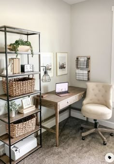 a home office with a desk, chair and bookshelf in the corner on carpeted flooring