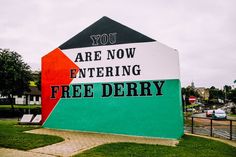 there is a large sign that says you are now entering free derby