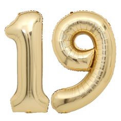 the number nine is made out of gold foil and has a large balloon in the shape of an eight