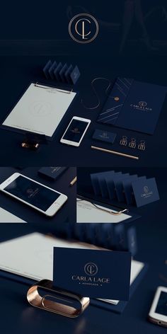 an assortment of cell phones and business cards on a blue surface with gold foil lettering