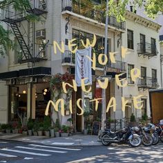 motorcycles parked in front of a building with the words new york next to it written over them