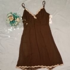 Brown Silk Spaghetti Strap Dress With Tan Lace Edging On Top And Bottom. Nwt. Just Haven't Had A Chance To Wear It. Brown Slip Dress With Spaghetti Straps, Brown Mini Dress With Spaghetti Straps For Beach, Brown Spaghetti Strap Mini Dress For The Beach, Brown Spaghetti Strap Mini Dress For Beach, Spring Brown Fitted Slip Dress, Fitted Brown Slip Dress For Spring, Brown Sleeveless Slip Dress For Spring, Sleeveless Brown Slip Dress For Spring, Brown Sleeveless Slip Dress For Summer