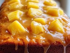 there is a cake with pineapple topping on it