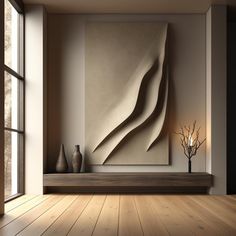 an abstract art piece is displayed in the corner of a room with wooden floors and large windows