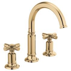 two handle bathroom faucet in polished brass finish with matching handles and side spray