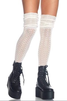 You'll love the amazing crochet pattern and the adorable scrunched look in these unique stockings. Pair this with boots for an outfit that's feminine, soft, and irresistible. Fitted Mid-calf Stockings For Fall, Winter Lace Fitted Legwear, Thigh High Cable Knit Socks For Stocking Stuffer, Thigh-high Cable Knit Socks For Stocking Stuffers, Thigh High Cable Knit Socks, Stretch Knitted Thigh High Socks, Stretch Cable Knit Thigh High Socks, Stretch Thigh High Cable Knit Socks, Thigh High Stretch Cable Knit Socks