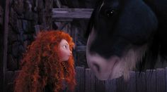 a red - haired girl looks at a horse's head in a scene from the animated film brave