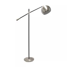 a lamp that is on top of a metal stand with a white light behind it