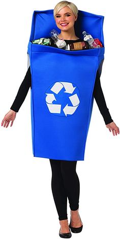 a woman in a blue recycle costume holding a large bag full of garbage