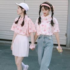 These Peach Print Blouses are the perfect addition to your cute and kawaii wardrobe. Available in white or pink, these blouses feature a playful print of delicate peaches, adding a touch of whimsy to your outfit. The lightweight and airy fabric makes them perfect for any season, keeping you cool in the summer and easily layering for the cooler months. These blouses feature a relaxed fit and short sleeves, making them ideal for casual outings or dressier occasions. Pair them with high-waisted jea Kawaii Wardrobe, Japanese Preppy, Kawaii Peach, Christmas Elf Outfit, Peach Print, Christmas Tree Dress, Chiffon Tops Blouses, Elf Clothes, Chiffon Shorts