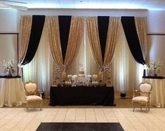 a banquet room with black and white decor