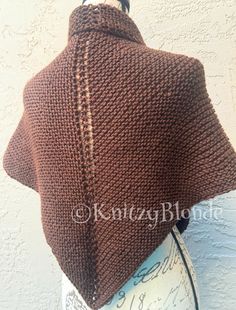 This is Claire's and Brianna's (from Outlander, season 5 & 6 & 7) everyday work shawl!  This practical, everyday shawl is hand knit just for you in a thick, chunky and warm 100% wool yarn. It is READY TO SHIP in the color shown here in this listing, a rich Chocolate Brown. This listing is for this OOAK item.   This shawl is a triangle shawl, approximately 70" from tip to tip, and 35" from center back top to bottom tip. It can be worn in a variety of ways, but most often, Claire and Brianna wear their work shawls high on the neck and wrapped around the torso and tied in the back. This is the perfect shawl to keep them warm while on Fraser's Ridge in season 5,6 & 7 of Outlander. For you, it's perfect to wear with everything from blue jeans to dresses!   If you are looking to order Claire's W Outlander Knitwear, Claire And Brianna, Outlander Season 7, Triangle Shawl, Color Chocolate, Triangle Shawls, Wool Yarn, Shawls And Wraps, Chocolate Brown