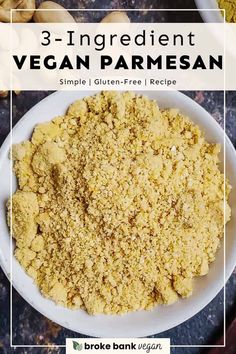 a white bowl filled with vegan parmesan on top of a black counter