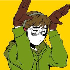 a person wearing glasses and a green jacket with his hands in the air above their head