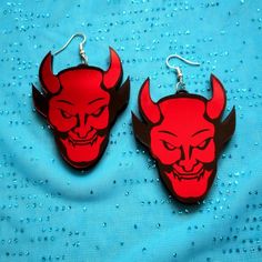 "SIZE: From top of earring post to bottom of pendant- 3 inches tall. DETAILS: *These eye-catching devil portrait earrings are a must have! *The image was laser cut by BC with mirrored red acrylic. *The majority of the devil's face are red, and the rest is black for an awesome contrast. *The pendants were attached to a lightweight layer of acrylic for extra durability. *Each pendant was then added to silver earring hooks securely. *These earrings are almost 3\" tall, but are still lightweight! Th Shrinky Dink Earrings, Grunge Pastel, Mirrored Acrylic, Pretty Jewelry Necklaces, Plastic Earrings, Earring Post, Clay Art Projects, Cute Nail Art, Acrylic Jewellery