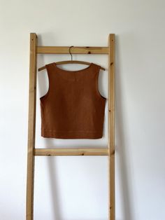 Fitted Linen Tank Top For Everyday, Fitted Linen Casual Tank Top, Casual Linen Tank Vest, Brown Sleeveless Linen Top, Sleeveless Brown Linen Top, Brown Cropped Cotton Tank Top, Summer Linen Vest For Layering, Cropped Brown Cotton Tank Top, Summer Cotton Crop Top For Layering