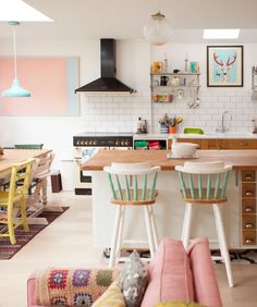 the kitchen is clean and ready to be used as a dining room or living room