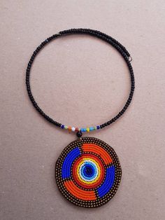 This listing is for ALL 5 beaded necklaces shown above. These necklaces are 100% handmade using fine beads. They come in different colors. Buy multiple items and pay shipping for ONE item ONLY. They ship through DHL Express. More neckleces here; https://www.etsy.com/shop/TribalTess?ref=seller-platform-mcnav&section_id=21306083 Back to my shop; https://www.etsy.com/shop/TribalTess?ref=seller-platform-mcnav Polished Bead Pendant Necklace, Beaded Necklaces With Oval Black Beads For Gifts, Multicolor Beaded Necklace With Pendant, Multicolor Pendant Necklace With Polished Beads, Round Black Beaded Necklaces For Jewelry Making, Black Oval Beaded Necklaces For Gifts, Gift Black Beads Pendant Necklace, Gift Beaded Necklace With Large Beads And Round Pendant, Gift Black Beaded Pendant Necklace