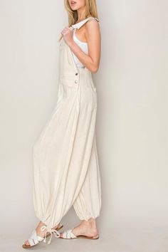 Details LINEN OVERALL HAS A SQUARE NECK WITH THICK SHOULDER STRAPS ATTACHED TO A RELAXED FIT Content + Care 75% RAYON 25% LINEN White Overalls, Bodycon Dresses Casual, Graphic Tops, Dress Backs, Crop Tank, Sweater Jacket, Jacket Tops, Long Tops, Bottoms Pants