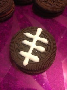 an oreo cookie with white frosting on it