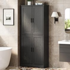 a bathroom with a white tub and black cabinet