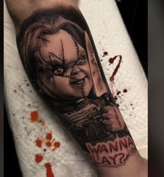 a person with a knife on their arm that says wannan't say?