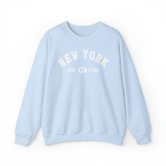 This aesthetic, cute and graphic design is perfect for those that are proud of the state of New York or NY. The design shows the year established. It is a great gift for men, women, kids, boys, girls and for her or him. All our trendy designs are unique. Ideal for any situation, a unisex heavy blend crewneck sweatshirt is pure comfort. These garments are made from polyester and cotton. This combination helps designs come out looking fresh and beautiful. The collar is ribbed knit, so it retains i Sports Sweater, Sport Sweater, Cozy Tops, Crewneck Design, I Love Ny, Bear Graphic, Great Gifts For Men, Boring Clothes, Sweater Jumper